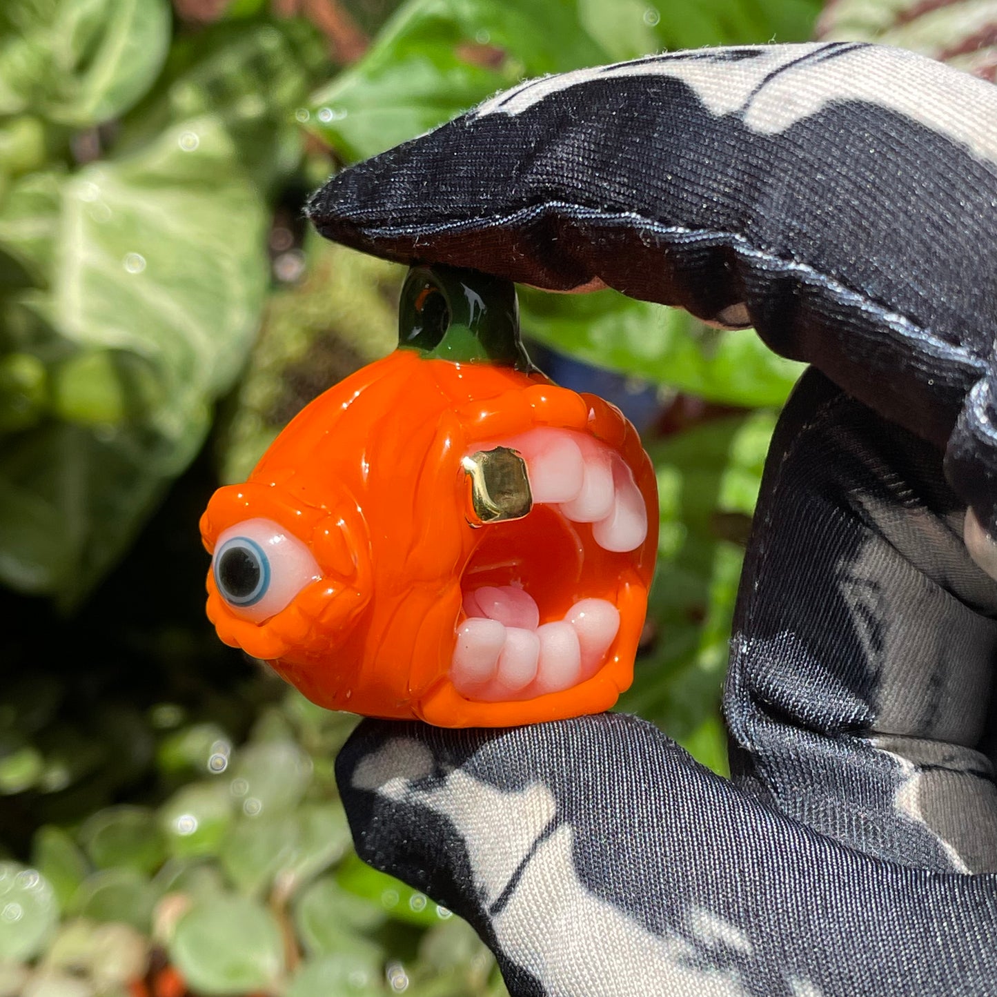 Pumpkin pendant detail view - premium glass art