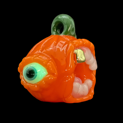 Close-up of Pumpkin pendant - handcrafted glass