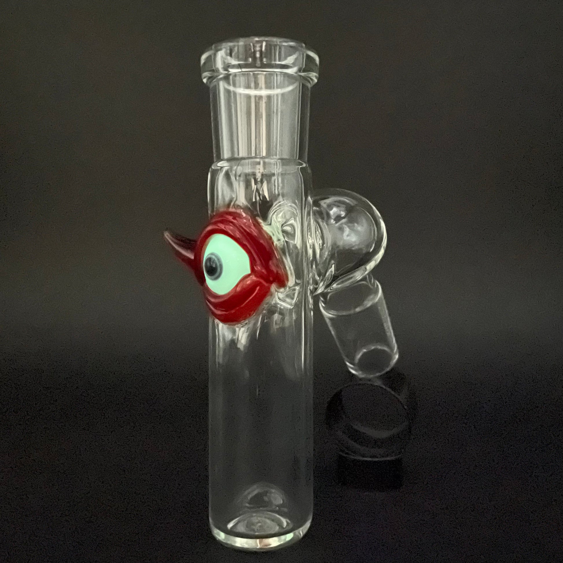 Close-up of 18mm 45° simple ash catch (eye) - handcrafted glass