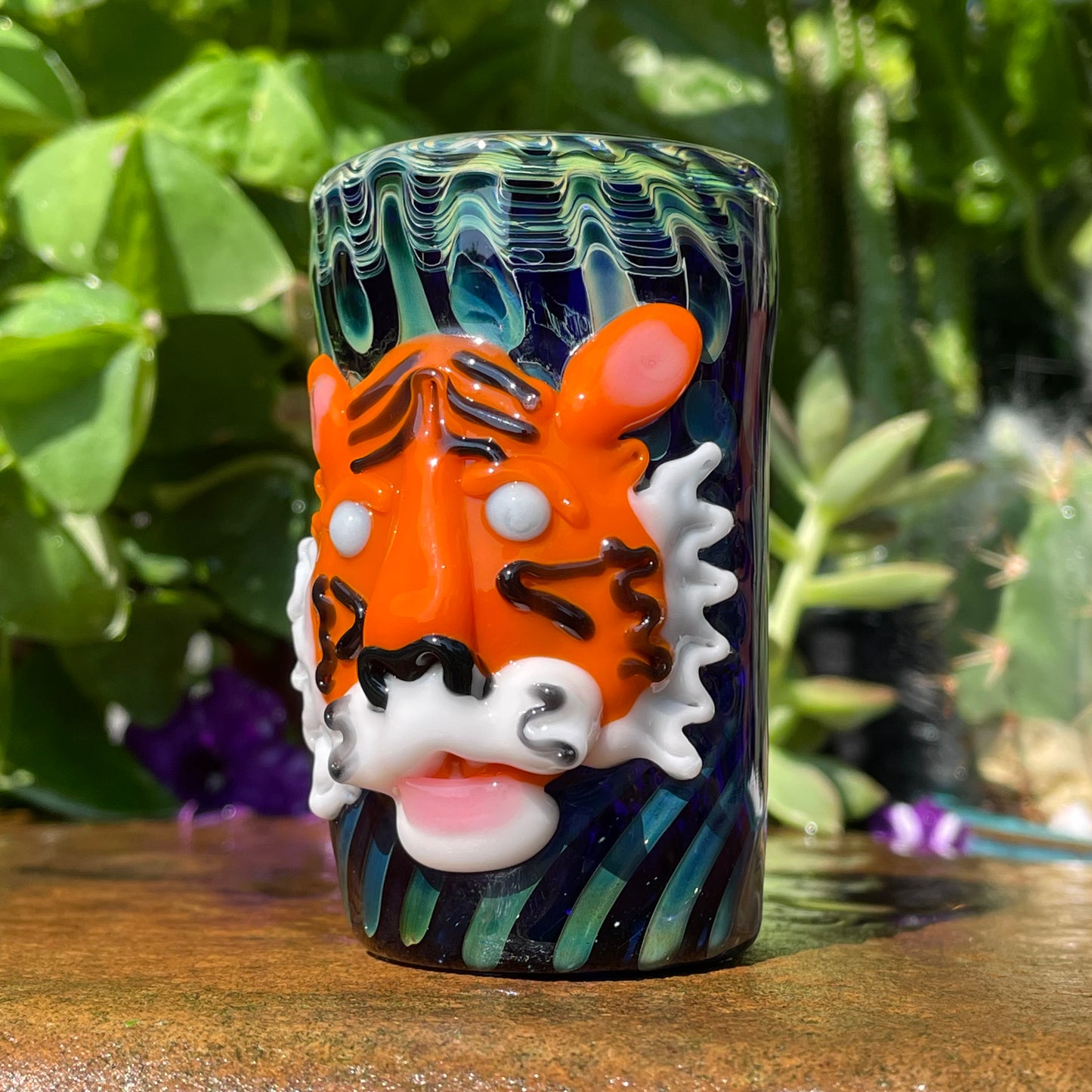 Close-up of Tiger shot glass - handcrafted glass