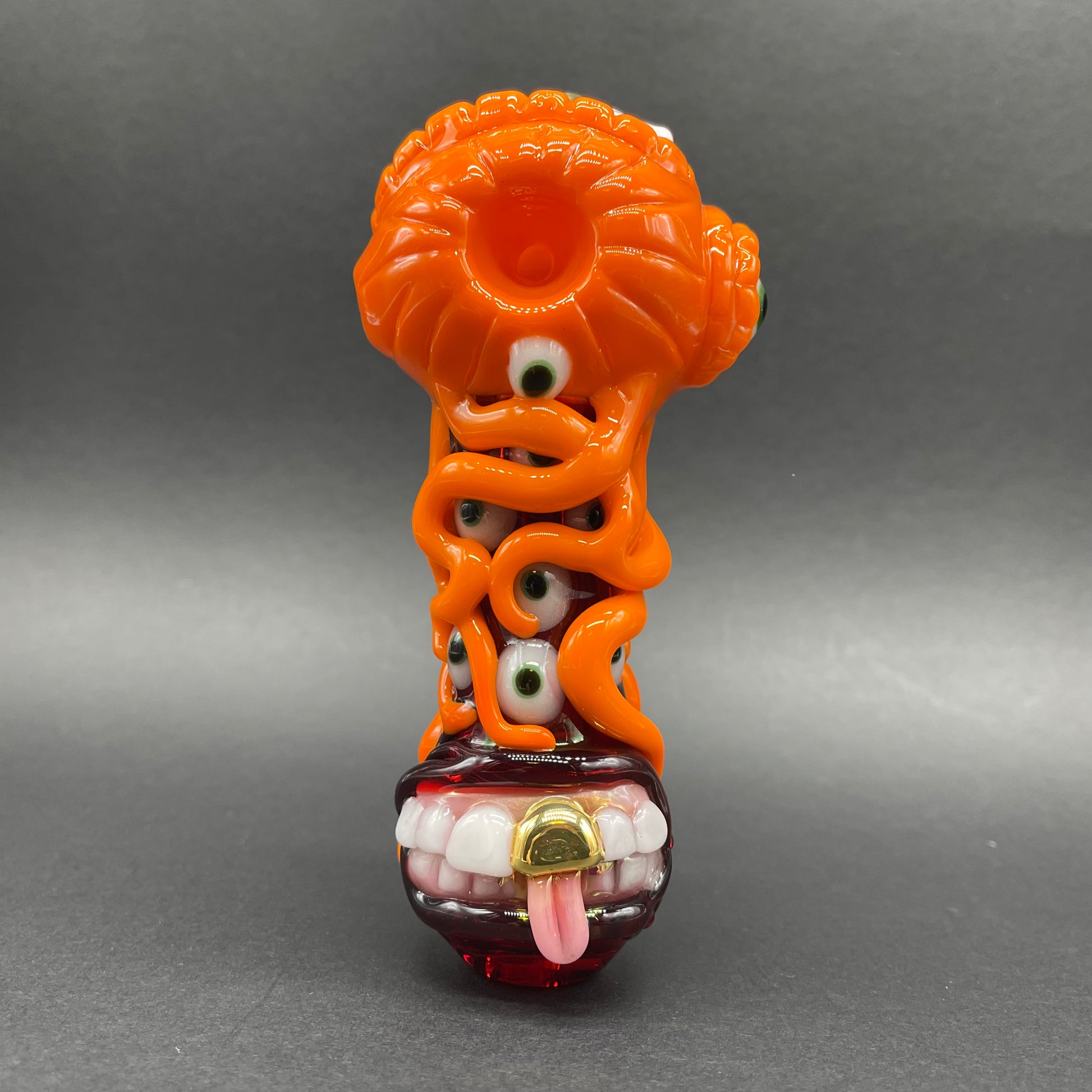 Hand-blown glass pumpkin tentacle spoon by Leviathan Glass