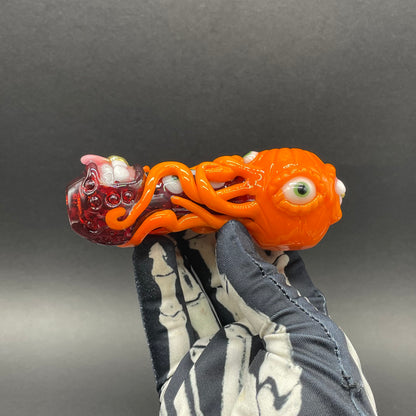 Close-up of pumpkin tentacle spoon - handcrafted glass
