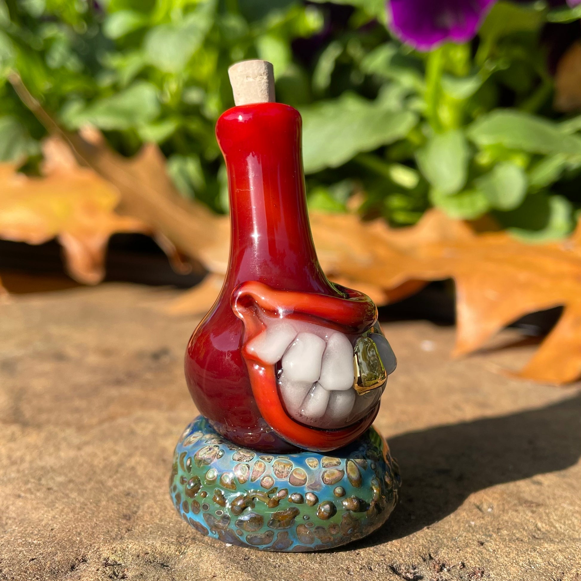 Red grinning glass cork bottle glass art - premium handcrafted piece