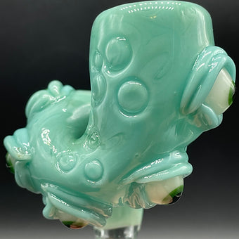 Close-up of 14mm Loopty Loop Aqua Slide - handcrafted glass