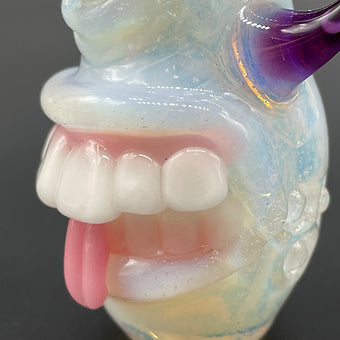 Close-up of Secret White Guardian Of The Rabbit Hole Spoon - handcrafted glass