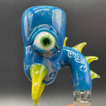 Close-up of 14mm Loopty Loop Peacock Slide - handcrafted glass