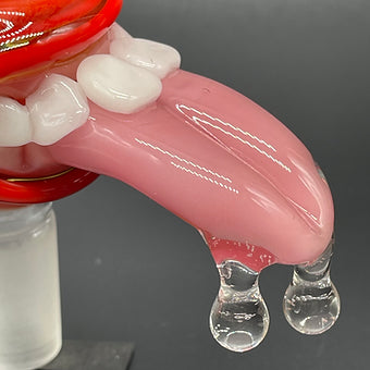 Hand-blown 14mm red blacklight reactive slide set with tongue and horn - Leviathan Glass original