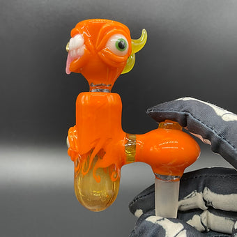 Close-up of 14mm lava mini ash catcher set with pumpkin slide. - handcrafted glass