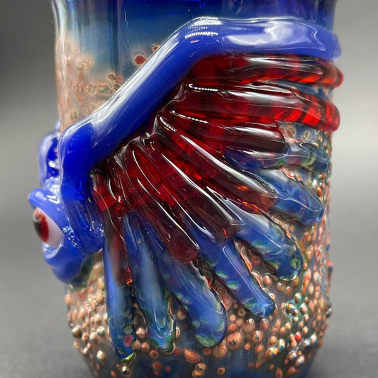 Winged phoenix shot glass (blue) detail view - premium glass art