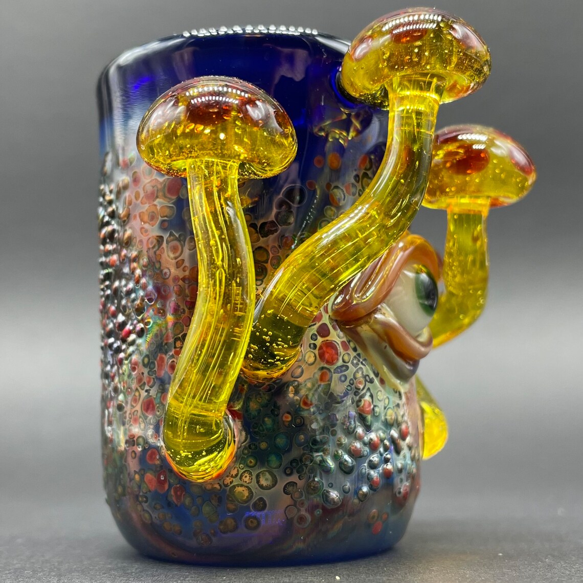 Yellow mushroom shot glass craftsmanship - artisan glass work