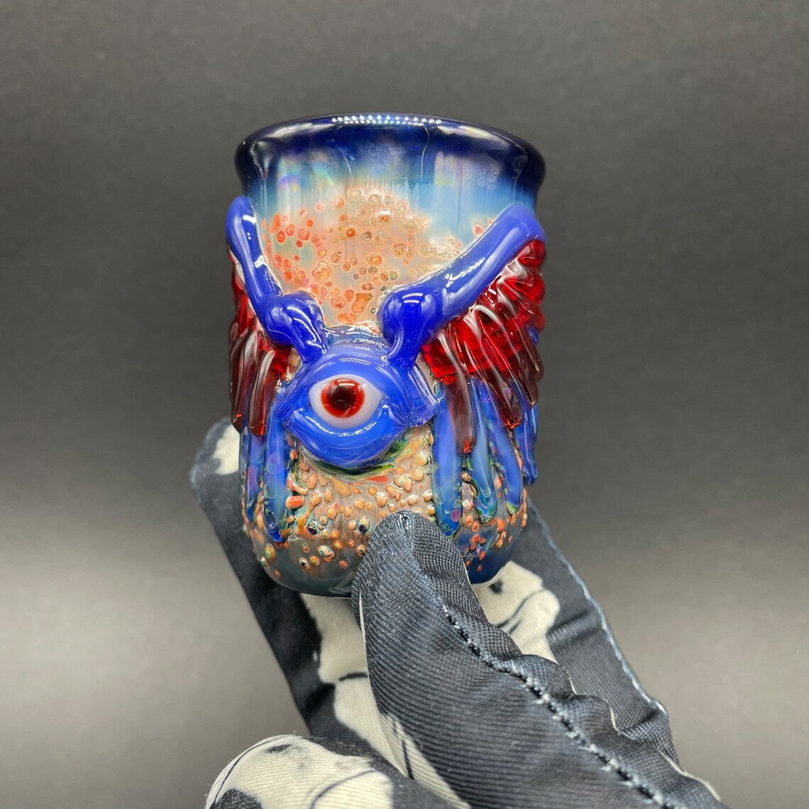 Winged phoenix shot glass (blue) by Leviathan Glass - artisan detail