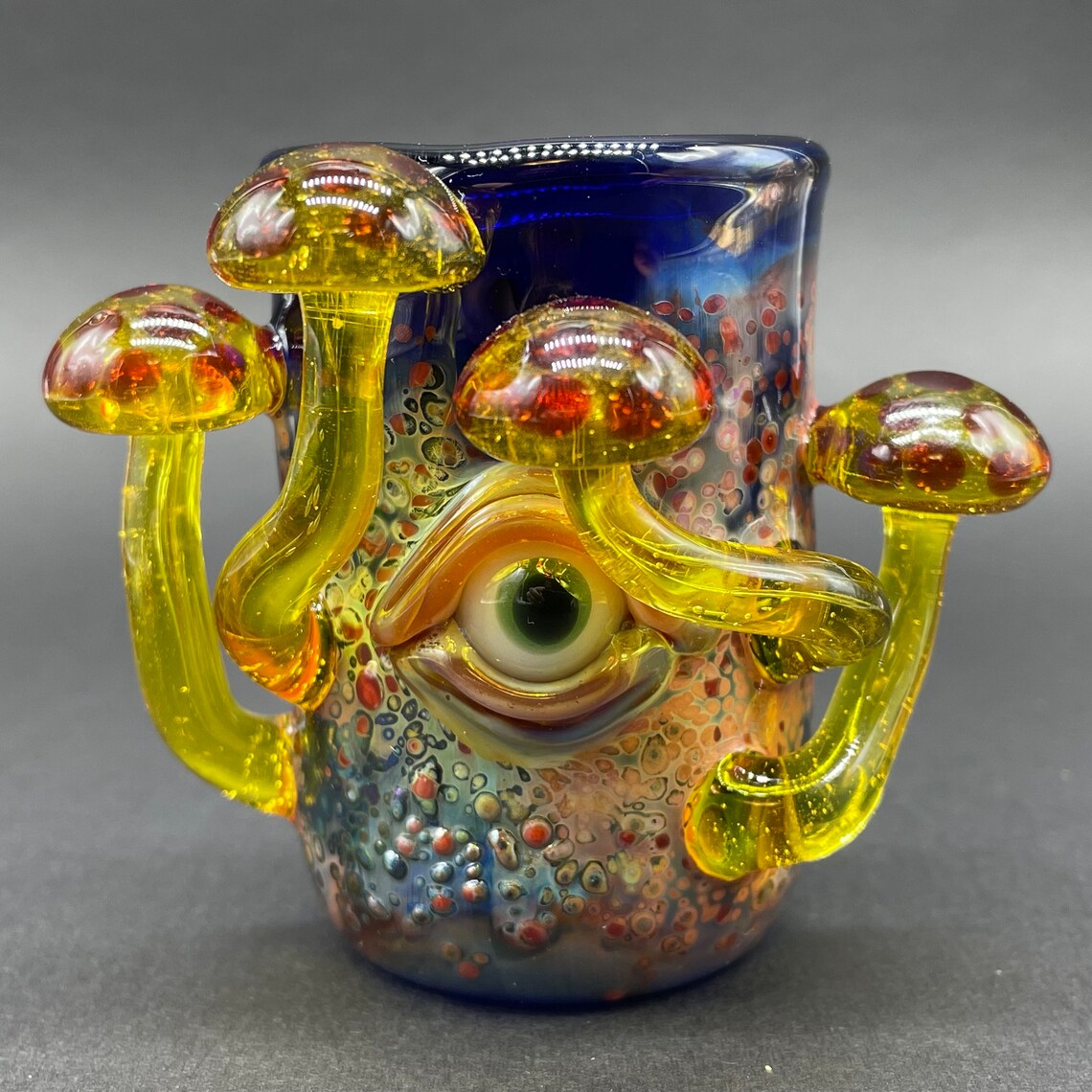 Yellow mushroom shot glass detail view - premium glass art