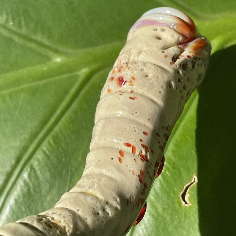 Hand-blown Glass makeup brush with glow in the dark eye and red suckers. - Leviathan Glass original