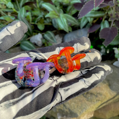 Close-up of 2 mushroom magnets - handcrafted glass