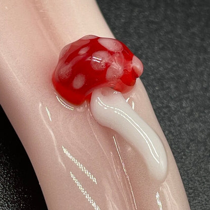 Close-up of Glass mushroom Tongue pendant - handcrafted glass