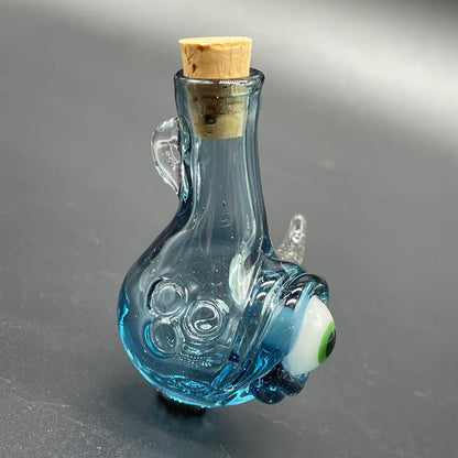 Close-up of Blacklight potion bottle - handcrafted glass