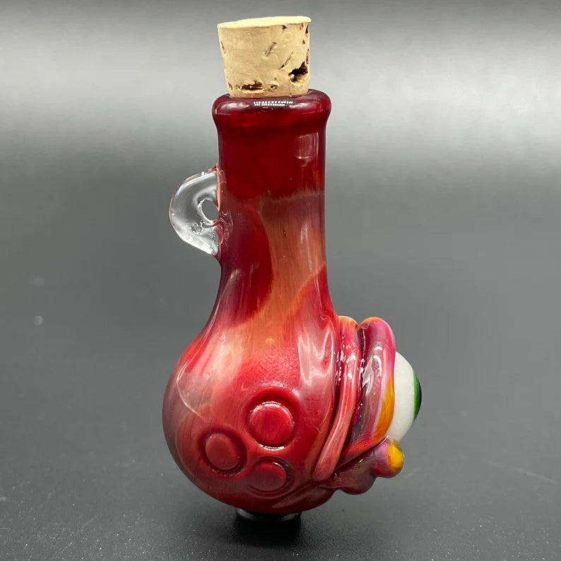Premium Sunrise red cyclops potion bottle - collectible glass art