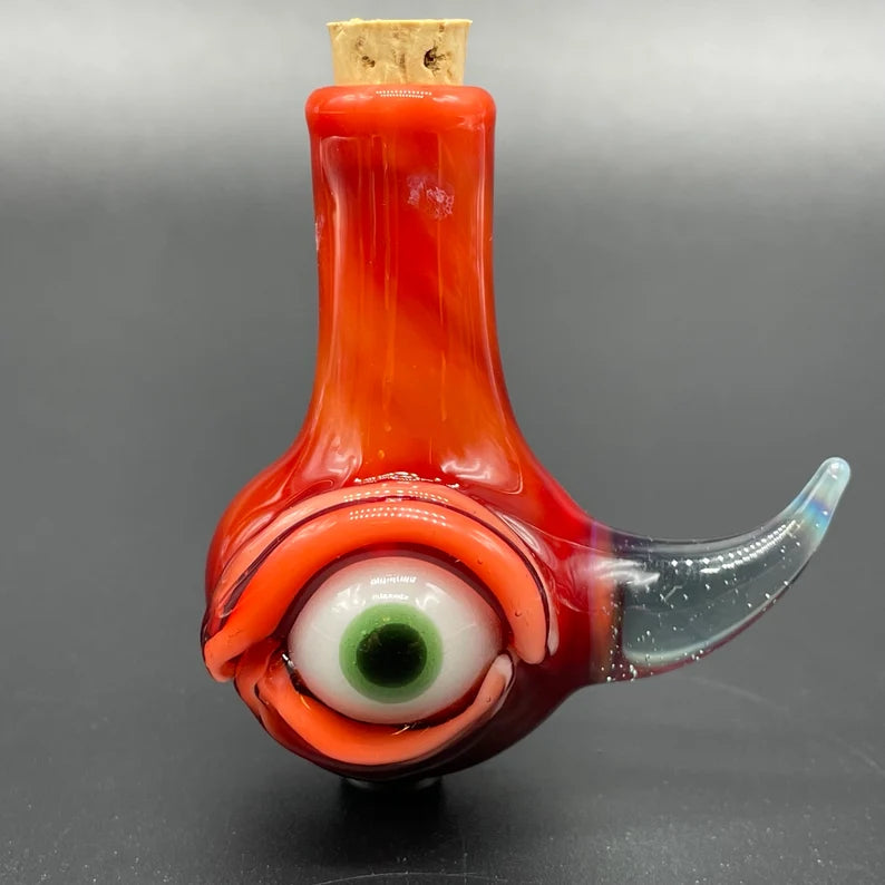 Red over white cyclops potion bottle by Leviathan Glass - artisan detail