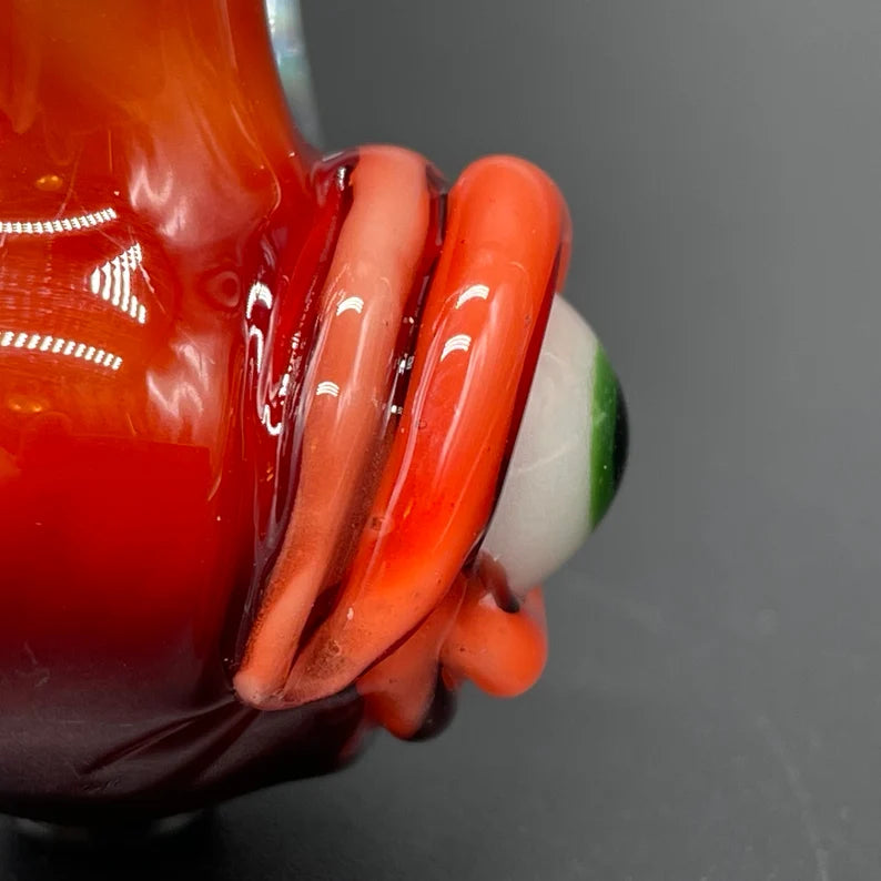 Red over white cyclops potion bottle craftsmanship - artisan glass work