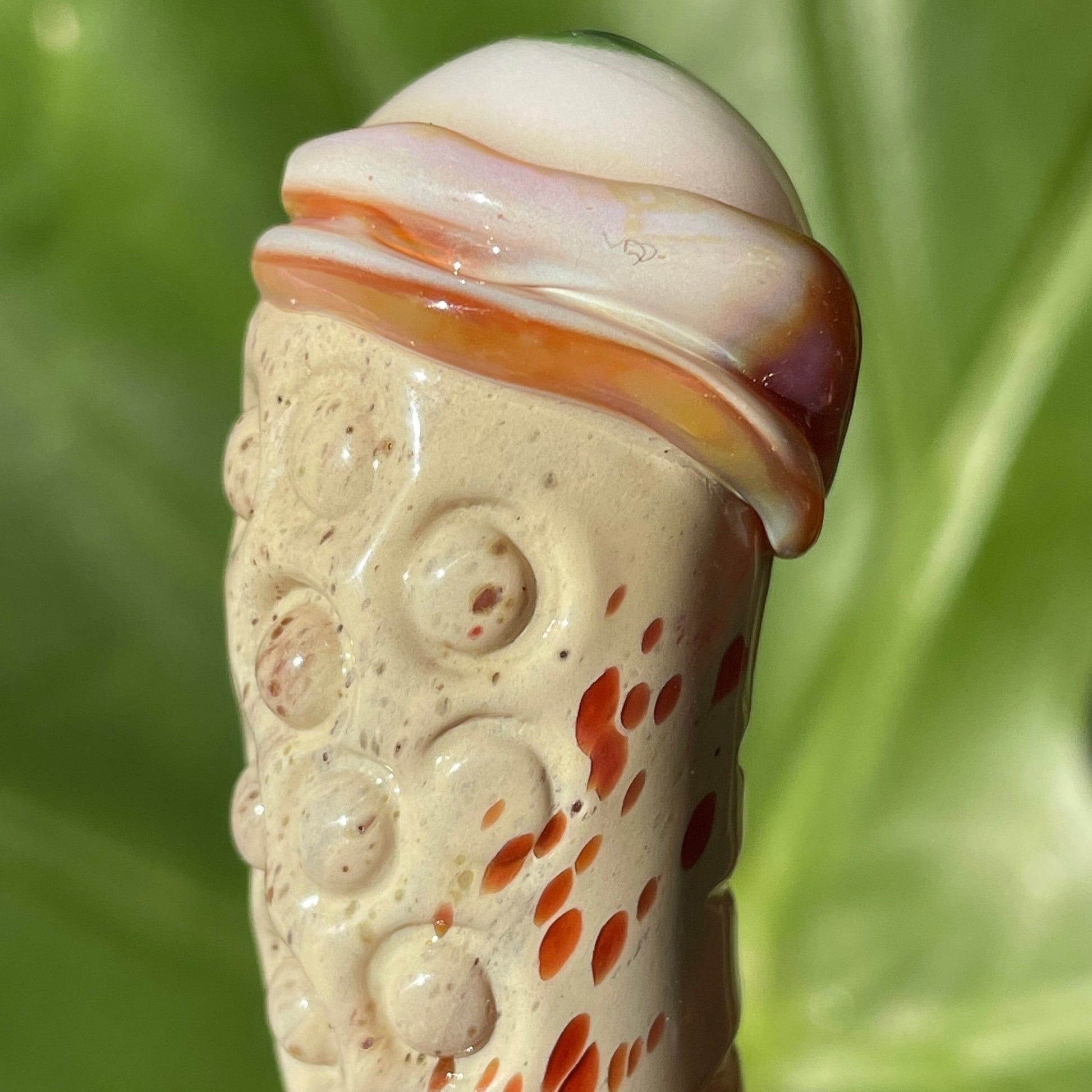 Glass makeup brush with glow in the dark eye and carved ventral scales. glass art - premium handcrafted piece