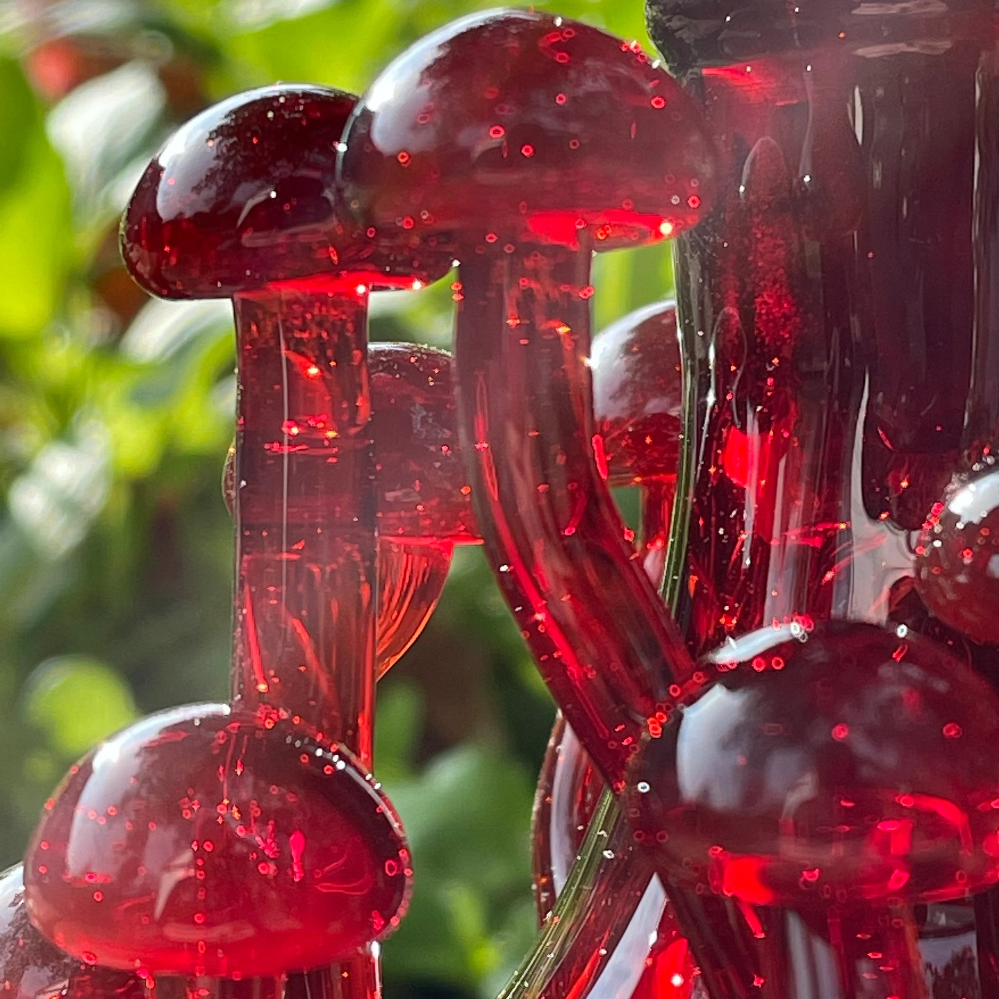Close-up of Red mushroom decanter - handcrafted glass