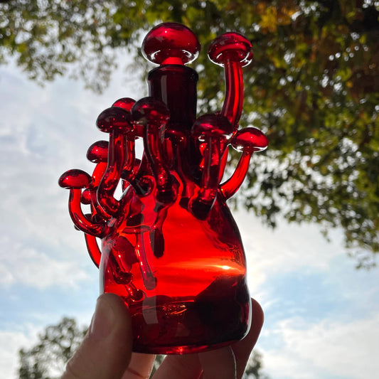 Red mushroom decanter detail view - premium glass art