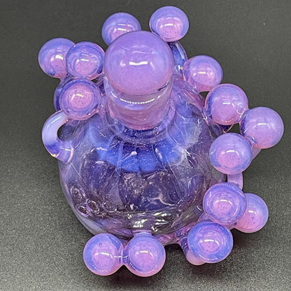 Close-up of Pink slime mushroom decanter - handcrafted glass