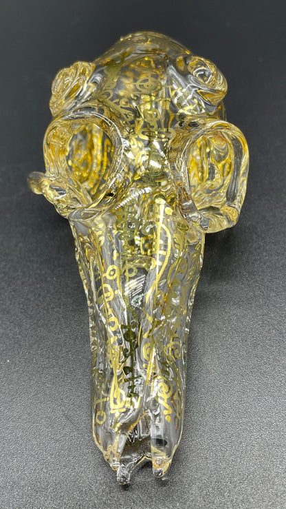 Close-up of Mystical Gold rune skull - handcrafted glass