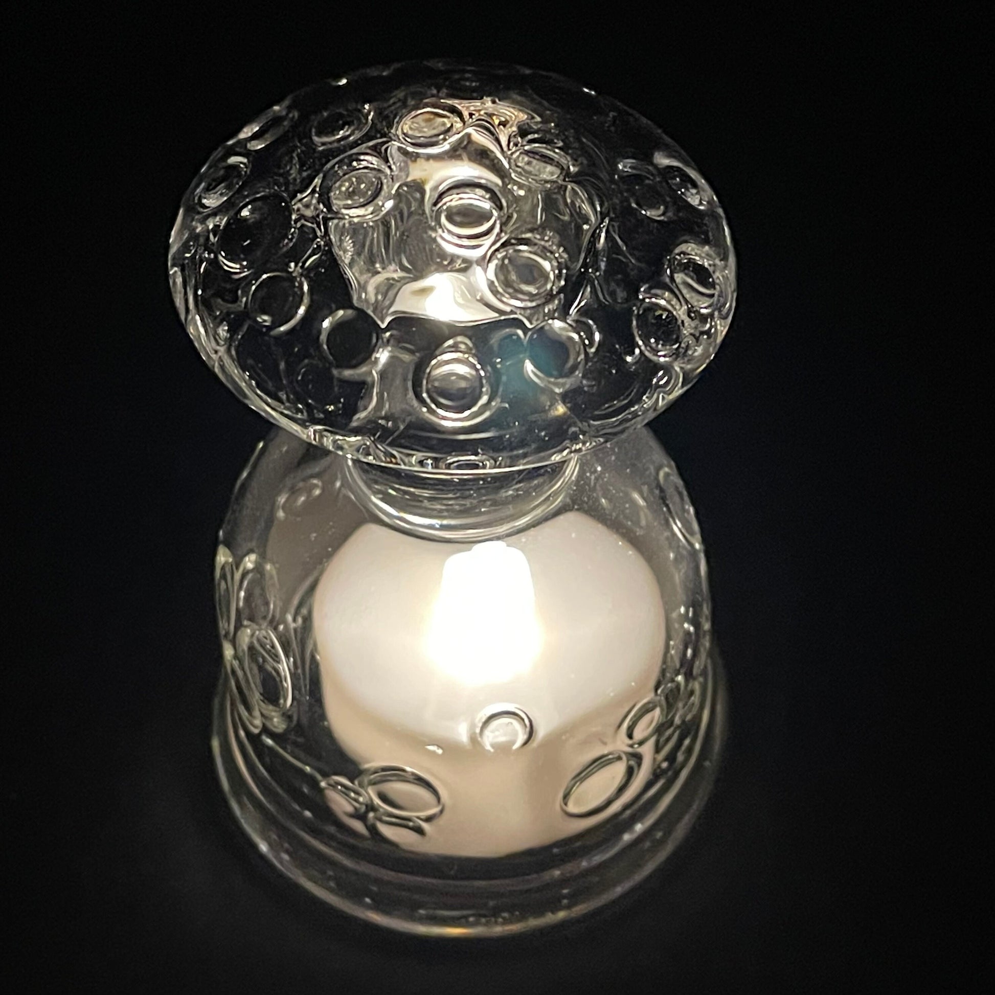 Votive mushroom light by Leviathan Glass - artisan detail